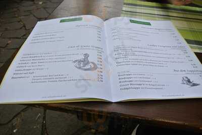 Weinlaube Schwarzer Hund