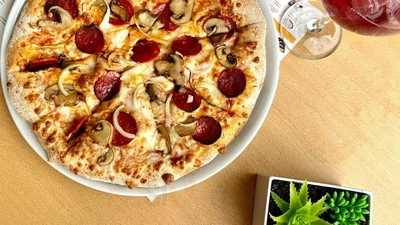 Nueva Pizzeria Carlos Sevilla