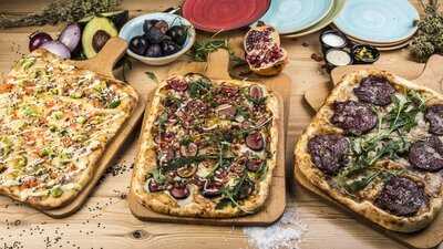 Kilómetros De Pizza