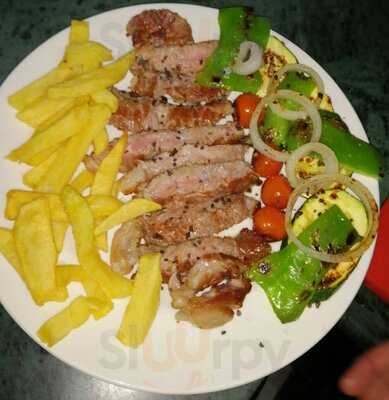 La Chimenea Restaurante Pizzería Asador