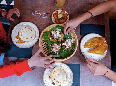 Raizal Arepería & Ronería