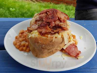 Mrs Potts By The River