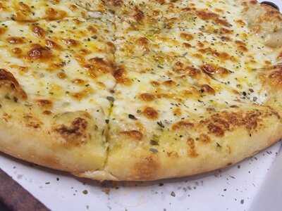 Shax Pizza Curry And Grill Bar