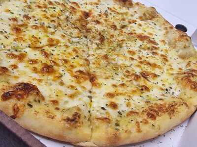 Shax Pizza Curry And Grill Bar