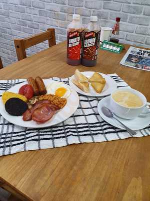 The Gold And Black Cafe