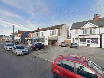 Caledonia Chicken And Ribs