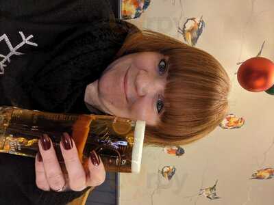 The Axe And Compasses