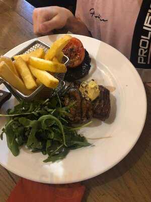 The Axe And Compasses