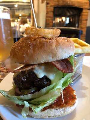 The Axe And Compasses