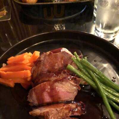 The Poet Bar And Grill