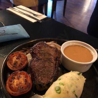 The Poet Bar And Grill